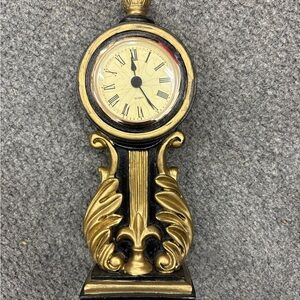 Elegant Gold and Black Wall Clock